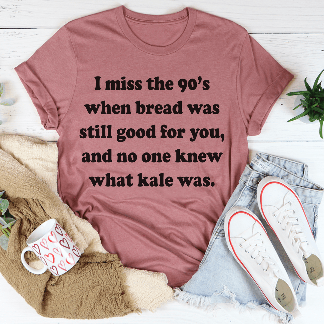 Mauve T-shirt with short sleeves and 'I miss the 90's' front slogan text.