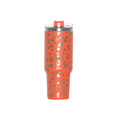Vacuum tumbler with red leopard pattern, straw lid, and clear spout cap