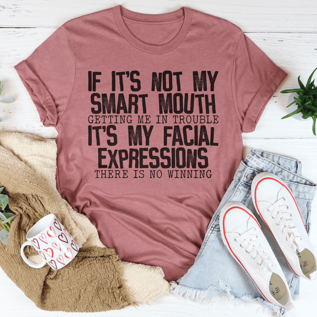 Mauve graphic T-shirt with “If it’s not my smart mouth…” and “facial expressions” lettering