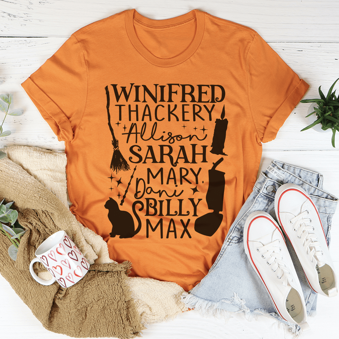 Burnt orange T-shirt with large black typographic print and cat silhouettes