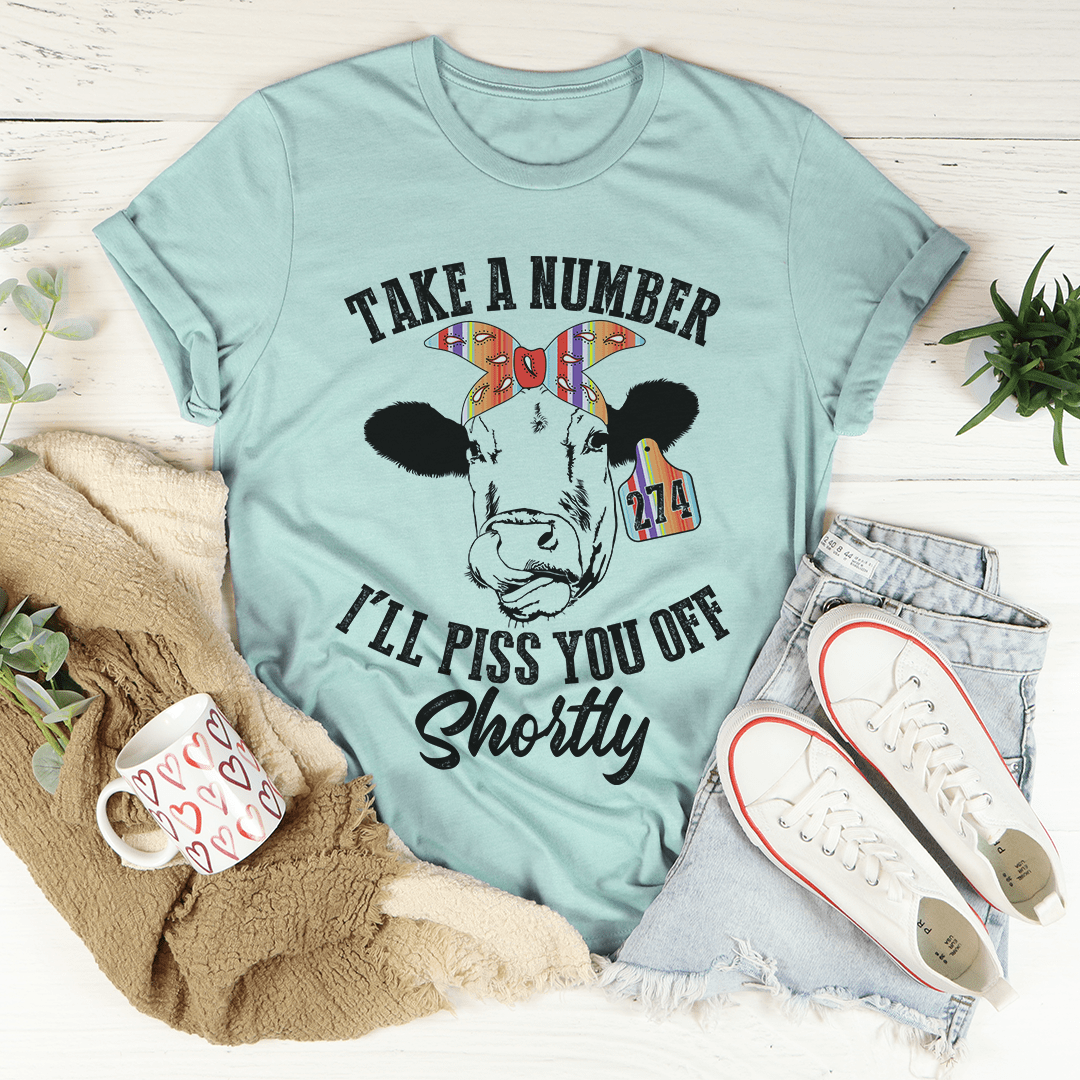Dusty blue cow T-shirt with slogan graphic and 'Shortly' script, crew neck, short sleeves