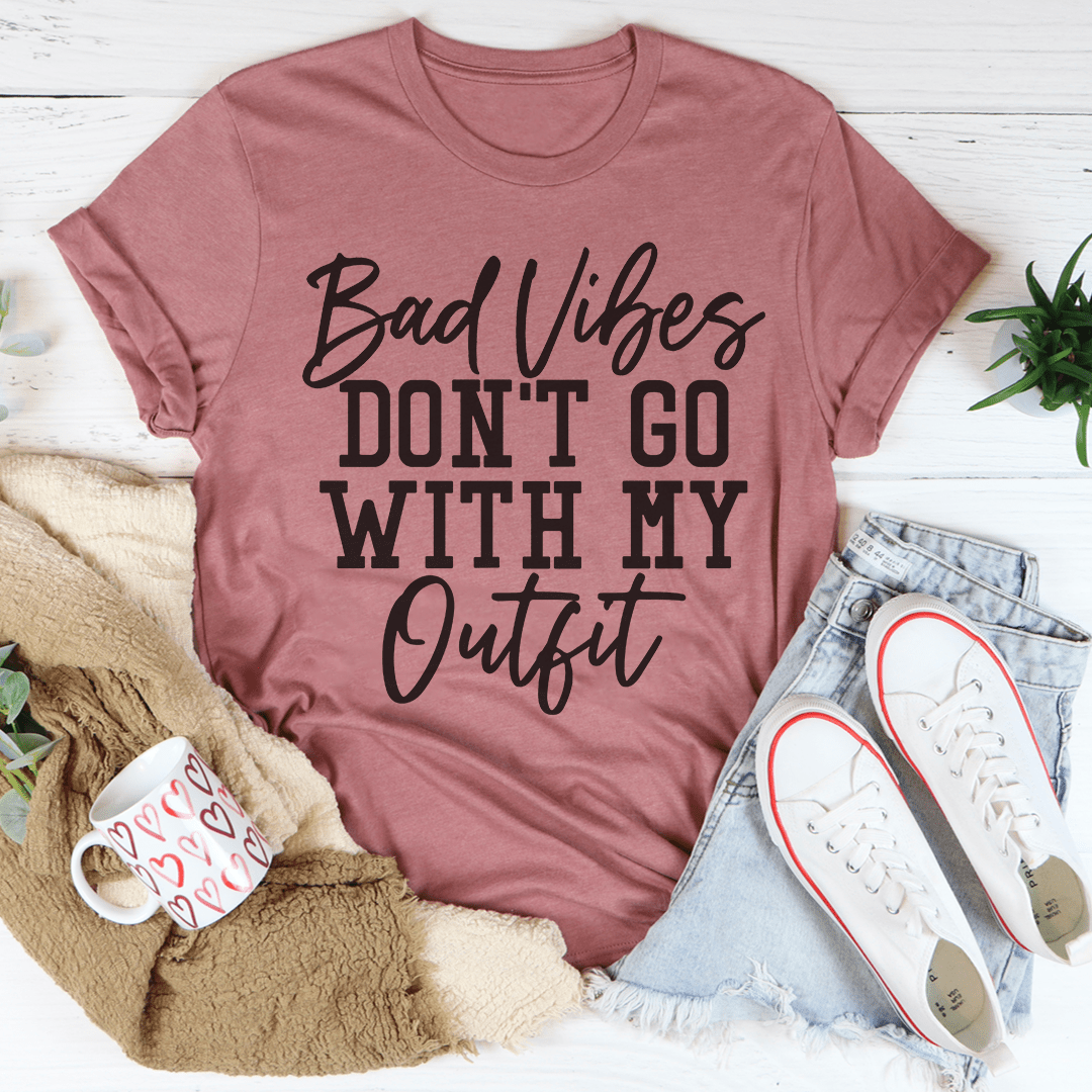 Mauve pink crewneck T-shirt featuring "Bad Vibes DON'T GO WITH MY Outfit"