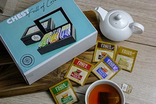 Tea bag chest with outer box and assorted tea packets, featuring a black insert.