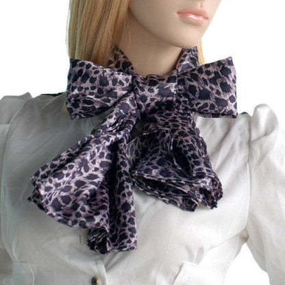 Leopard print silk scarf with knot and short drape at collar