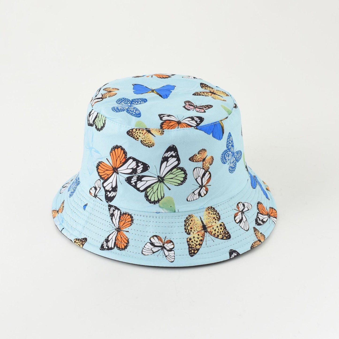 Butterfly bucket hat in light blue with multicolor wing prints, wide brim