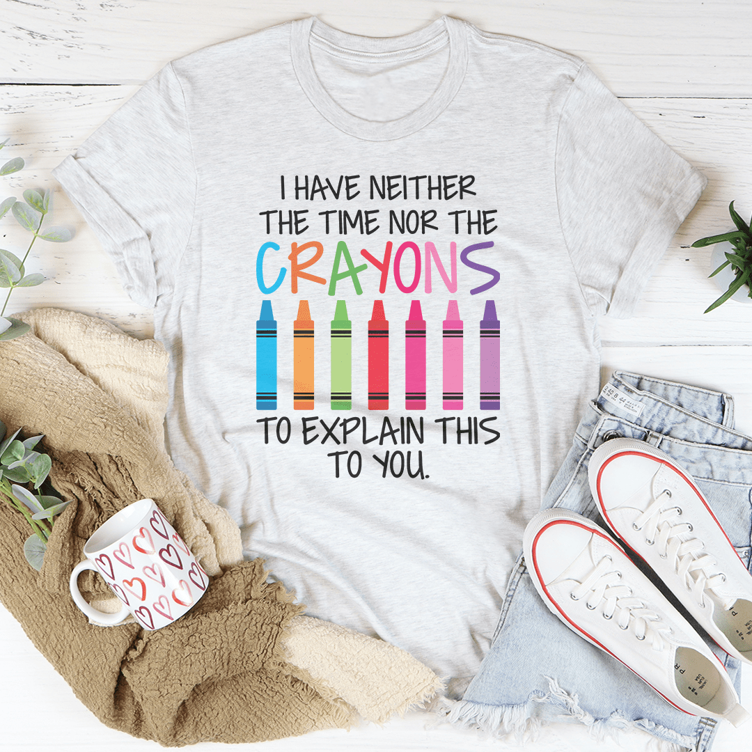 Light gray crew-neck T-shirt with large colorful crayon-style text print on front