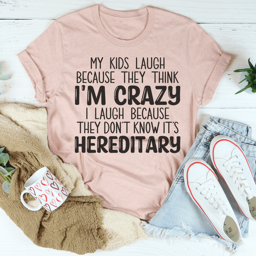 Pink heather crewneck T-shirt with 'I'M CRAZY' & 'HEREDITARY' text