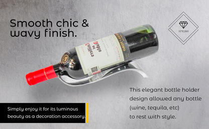 Curved chrome bottle holder with smooth wavy cradle for a bottle