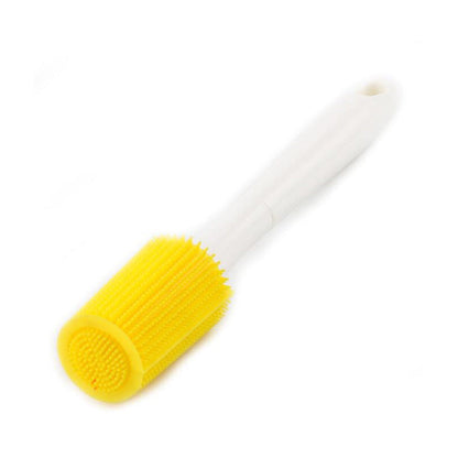 Silicone bottle brush cleaner with yellow ribbed head on white long handle