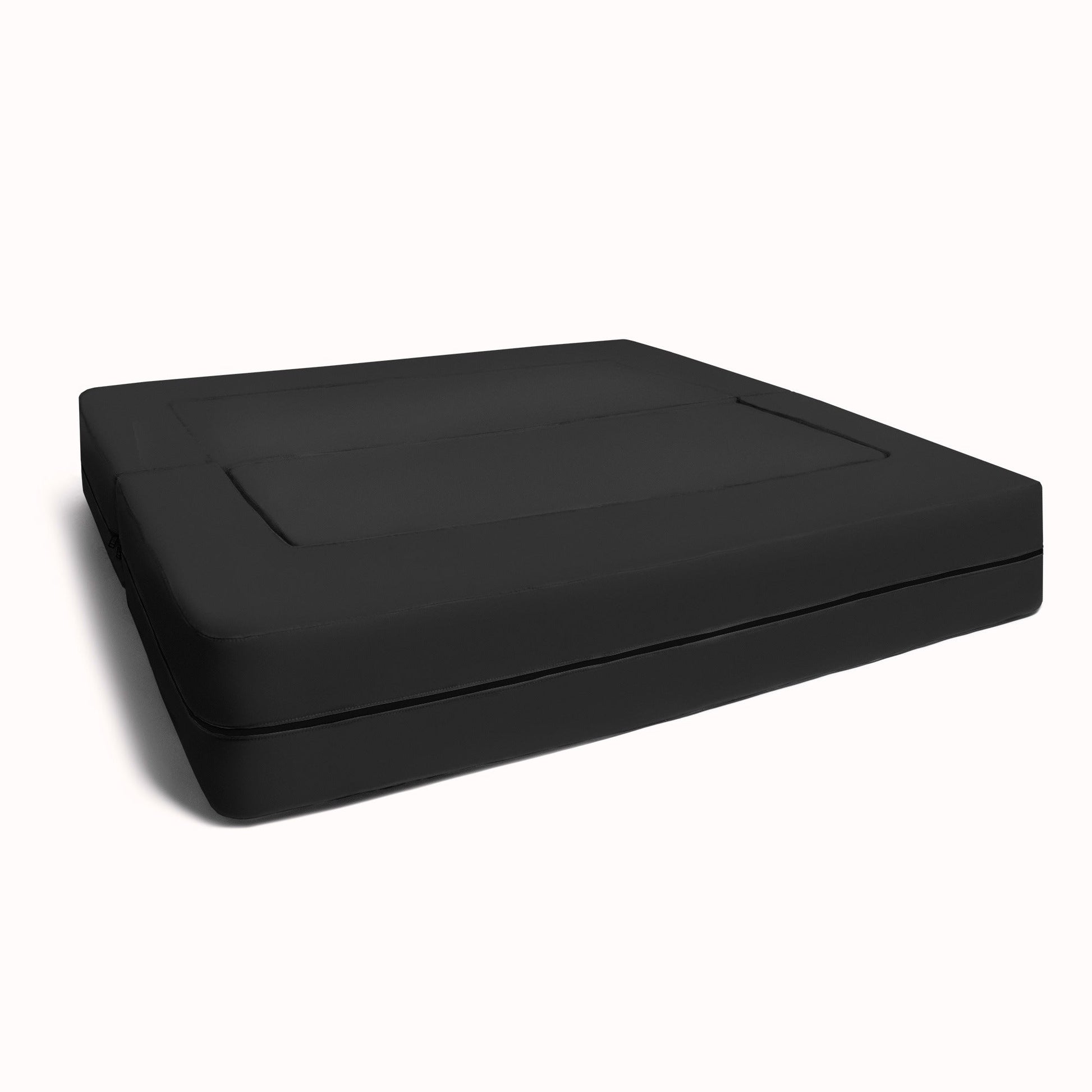 Black microsuede modular ottoman bench with rounded corners and stitched top