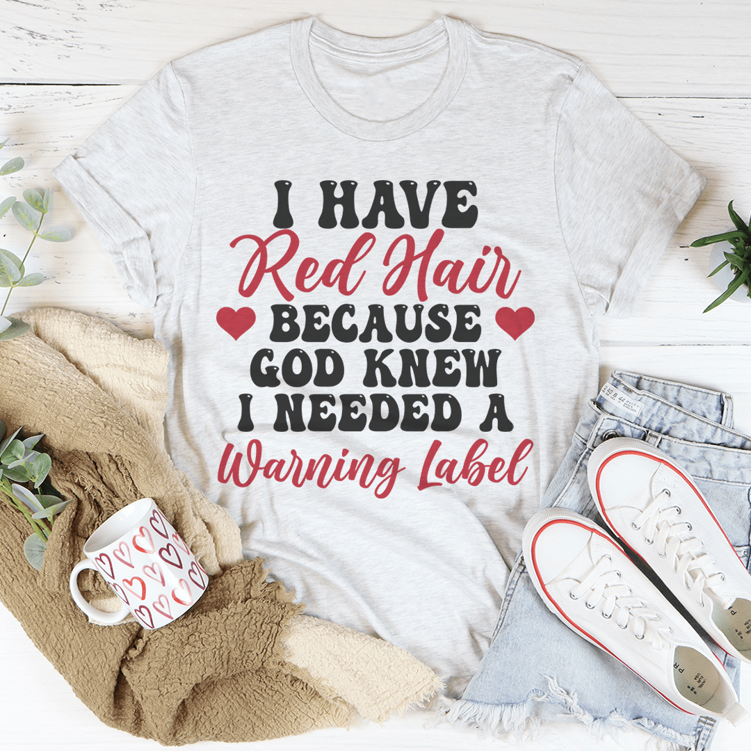 Light gray crew-neck T-shirt with 'Red Hair' hearts and 'Warning label' slogan