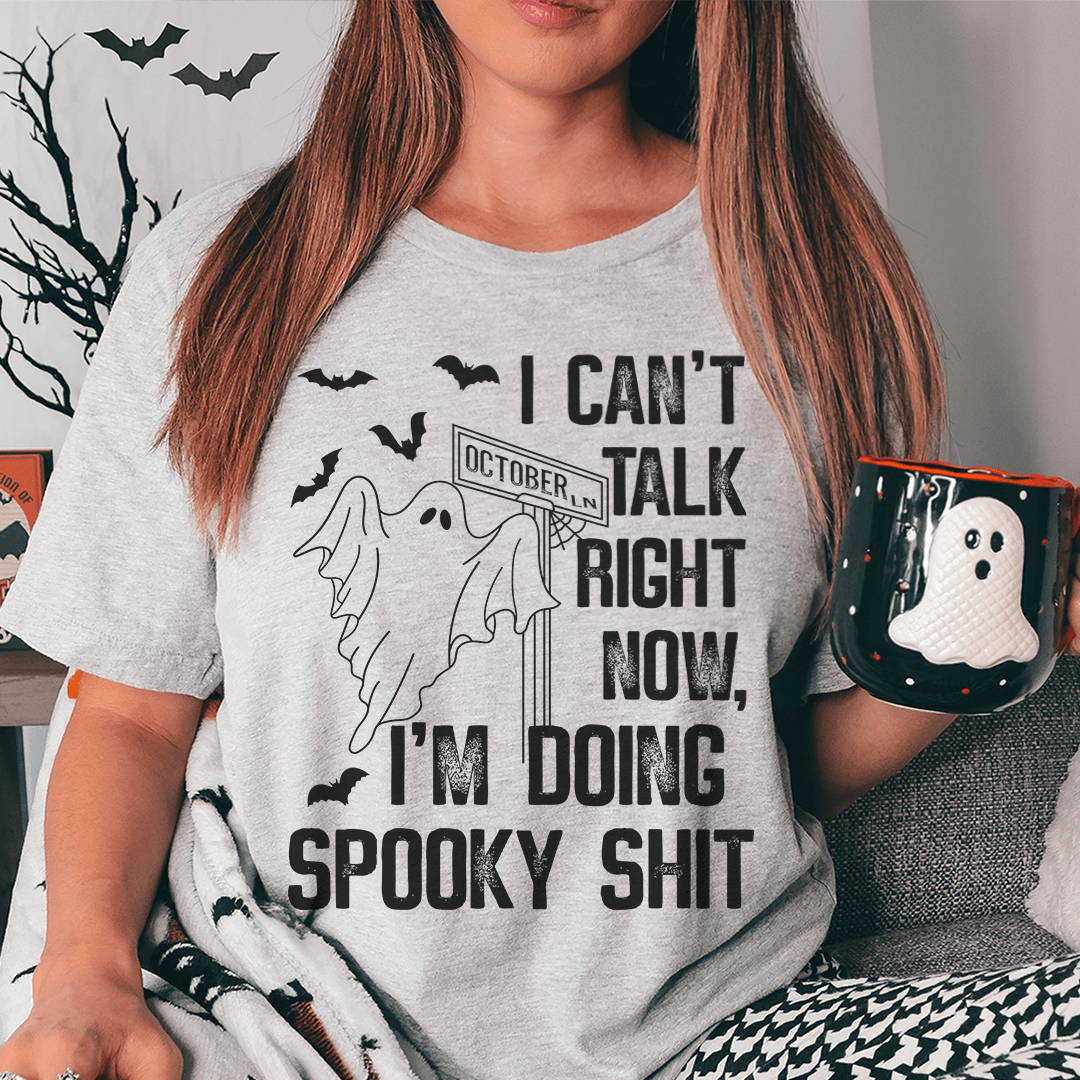Light heather gray T-shirt with ghost and bats graphic and bold black text
