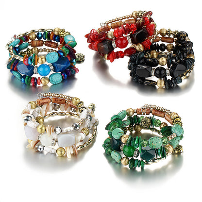 Four multilayer beaded charm bracelets in blue, red, green, and black with gold details