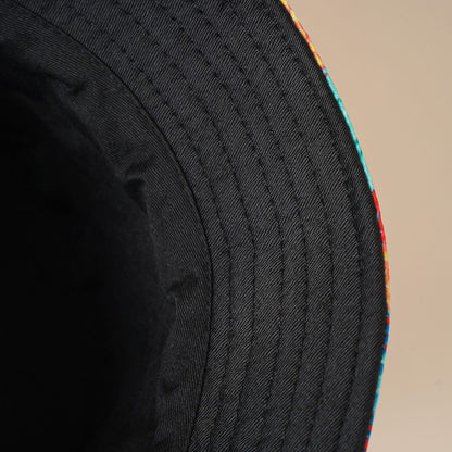 Close-up of dark ribbed fabric edge on the bucket hat brim