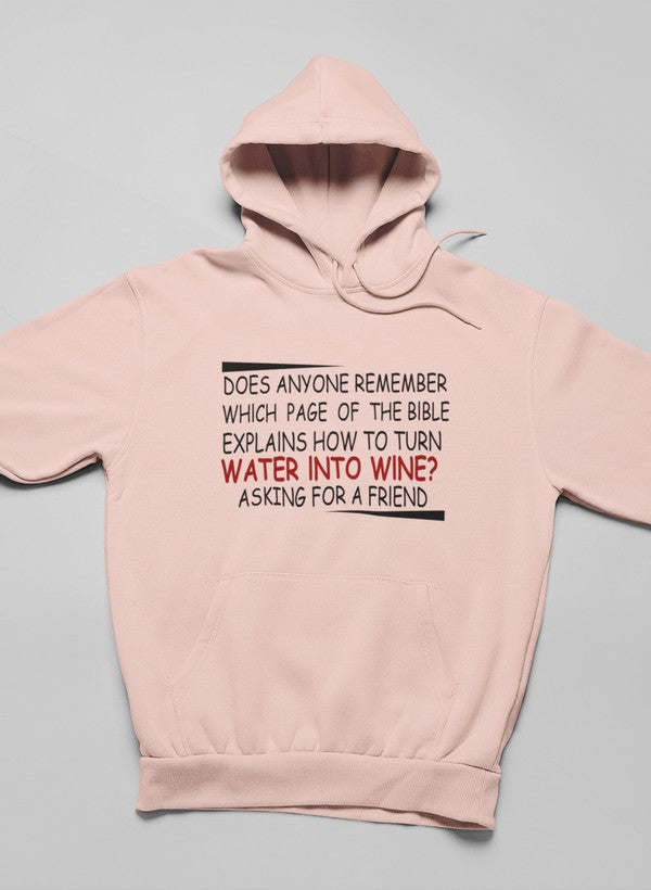 Peach hoodie with hood and front pouch pocket, graphic text on chest.
