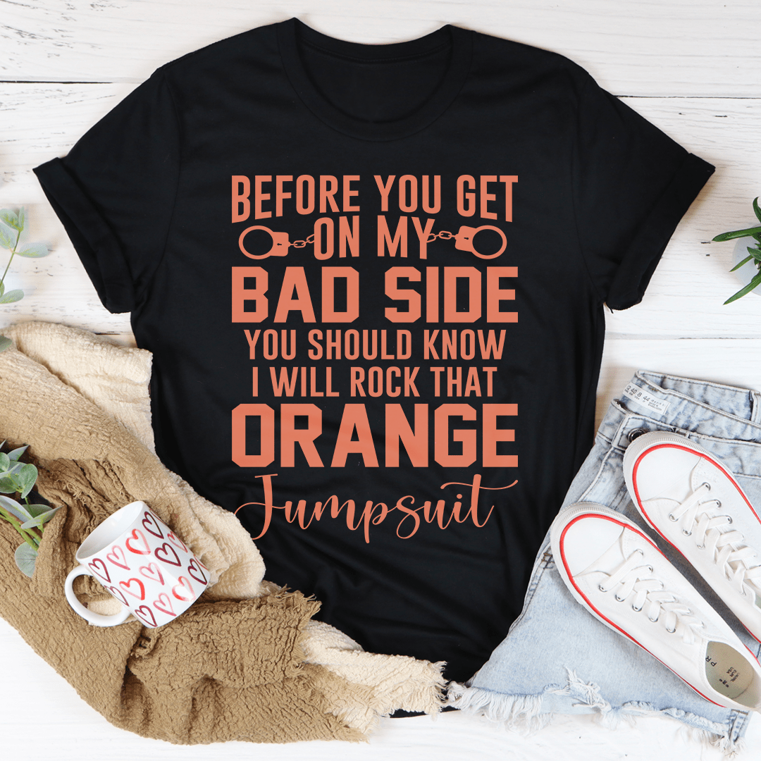 Black graphic T-shirt with orange “bad side” slogan