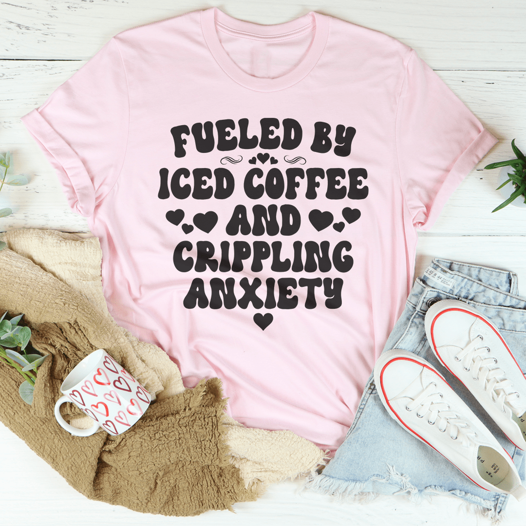 Pink V-neck graphic T-shirt with bold black slogan and heart accents.