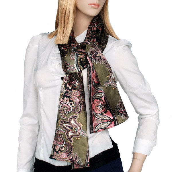 Paisley silk scarf worn at neck, dark brown with pink and gold motifs