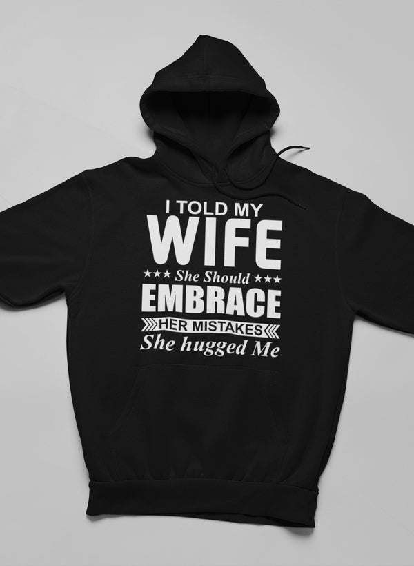 Back of black hoodie with bold slogan print and hood opening