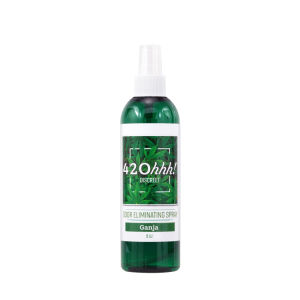 Green odor eliminator spray bottle with white cap, labeled Ganja.
