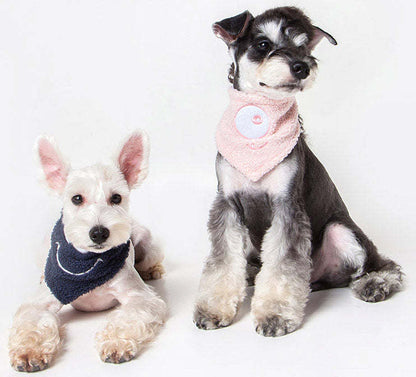 Dog bandana scarf set on two dogs: navy and pink bib-style bandanas