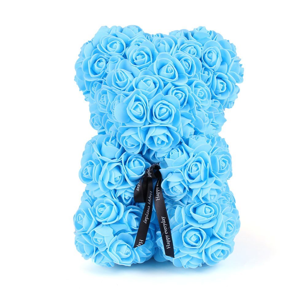 Light blue rose teddy bear made of layered rose petals with a black ribbon bow