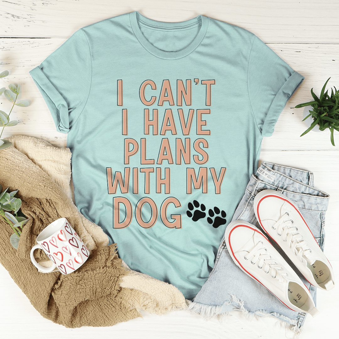 Teal T-shirt with 'I CAN'T HAVE PLANS WITH MY DOG' text and paw-print graphic