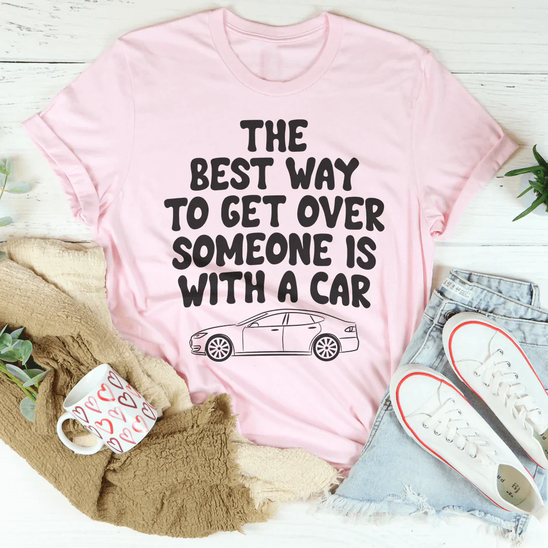 Pink crewneck T-shirt with black car slogan text and car outline graphic