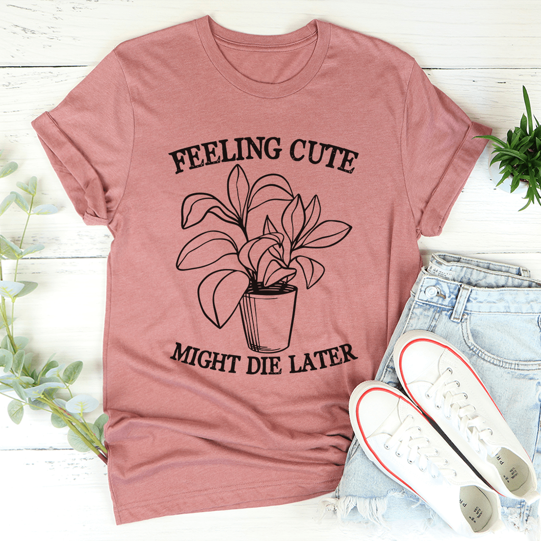 Mauve short-sleeve T-shirt featuring potted plant line art with FEELING CUTE and MIGHT DIE LATER