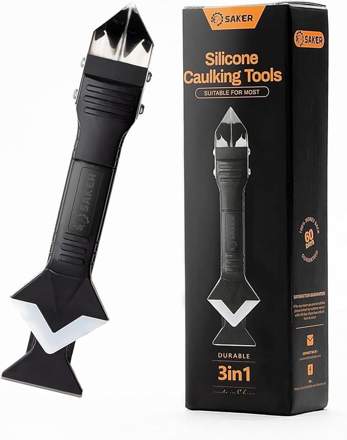 Black silicone caulking finishing tool with angled scraper head and grip handle