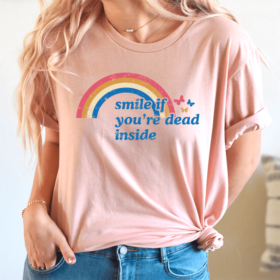Blush heather T-shirt with rainbow graphic and blue slogan centered on chest