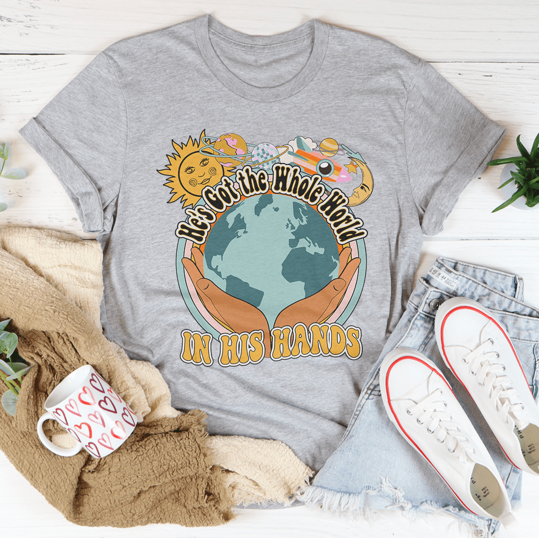 Heather gray T-shirt with globe graphic and text “IN HIS HANDS” on front
