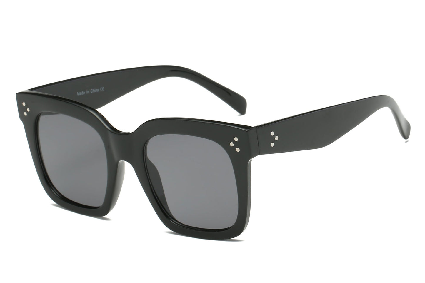 Black square flat-top sunglasses side view with dark gray lenses, stud details on temples