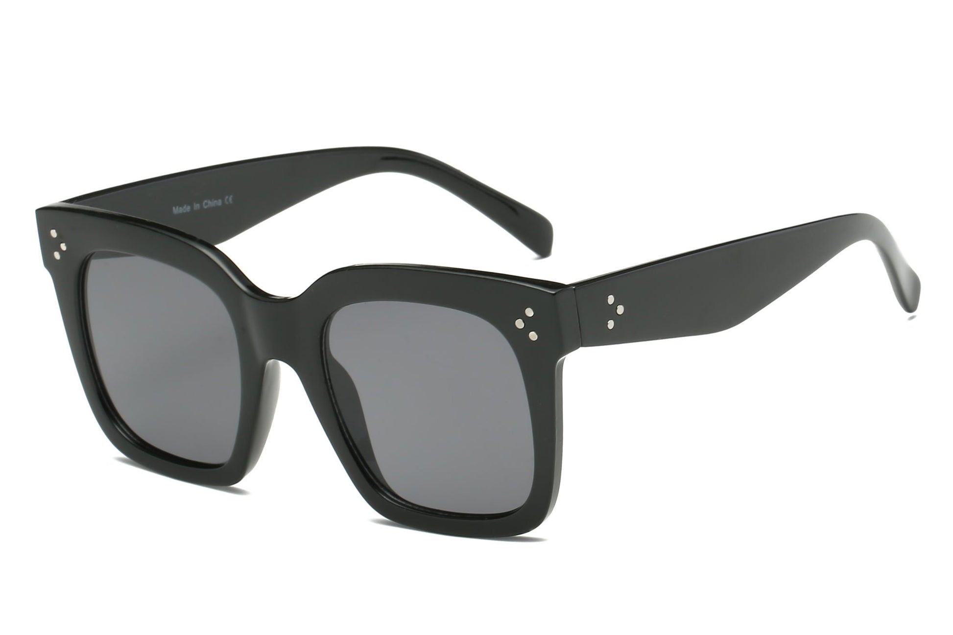 Black square flat-top sunglasses side view with dark gray lenses, stud details on temples