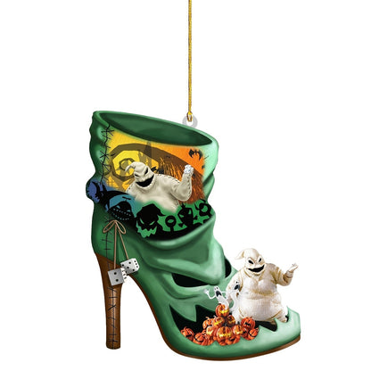 Acrylic pendant doll ornament of a green haunted shoe with skull and pumpkin-themed details.