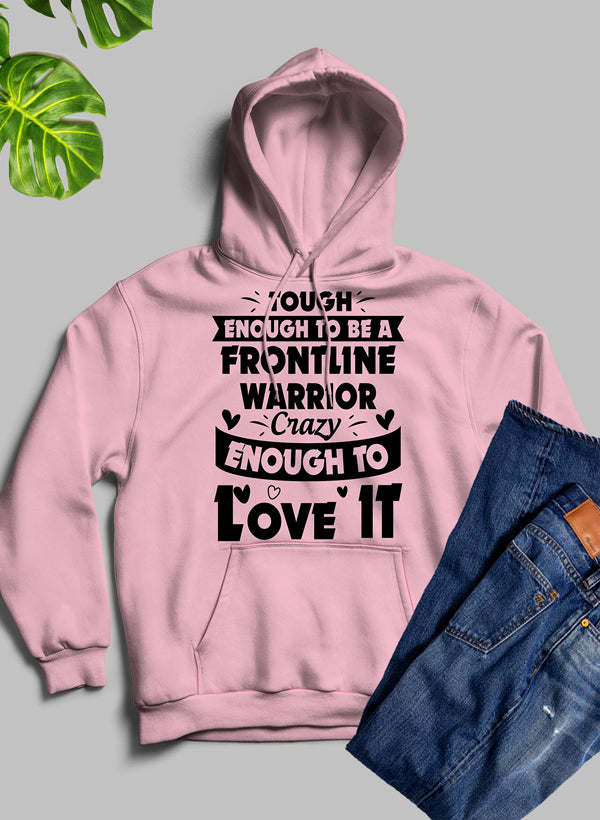 Pink hoodie with front graphic text 'Frontline Warrior' and 'Love It'