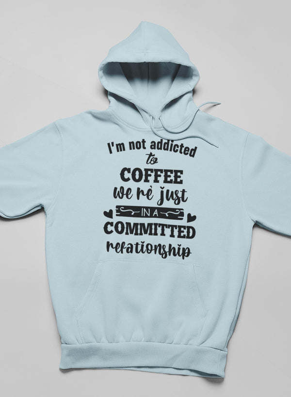 Light blue pullover hoodie with hood and coffee slogan text front print
