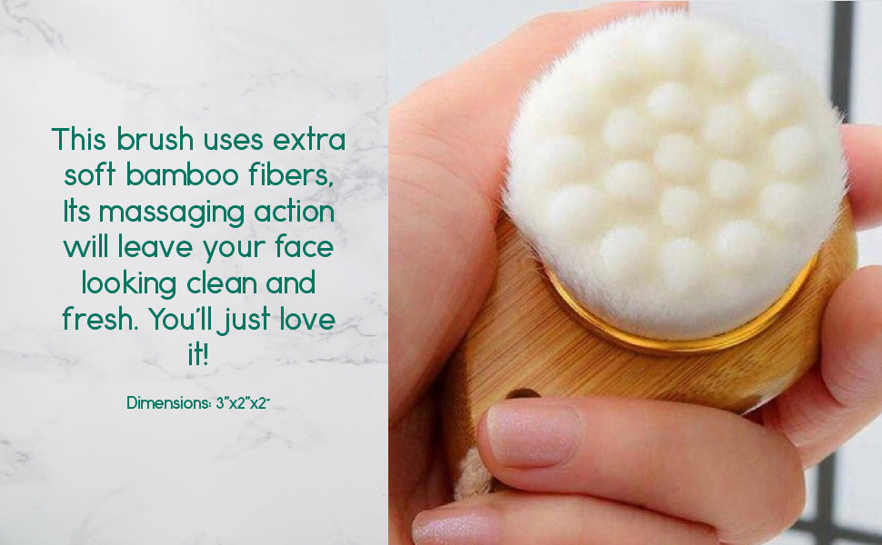 Facial brush head with soft white bamboo fibers held in a hand.