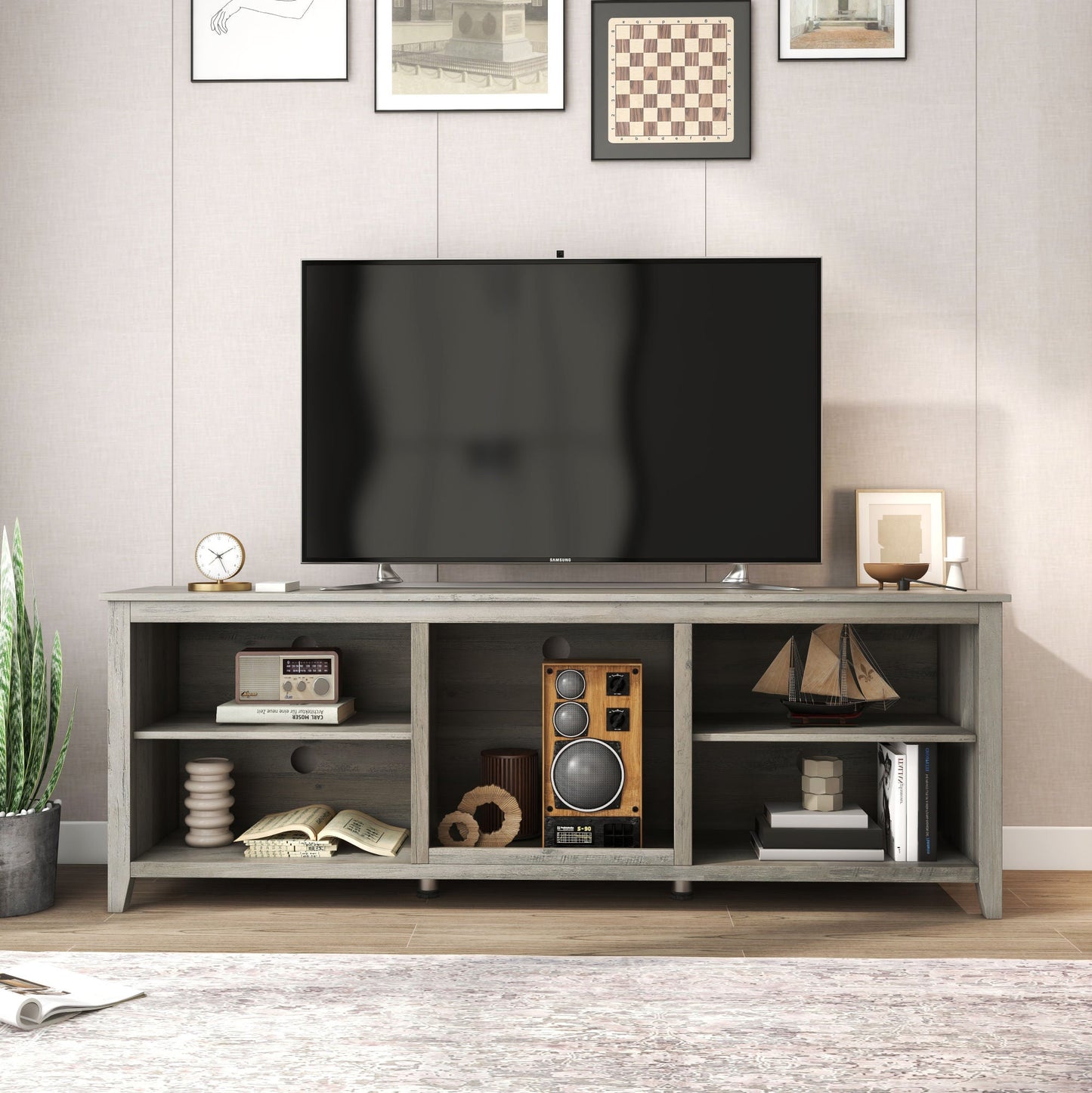 TV stand media console with central speaker cubby and open side shelves, light gray