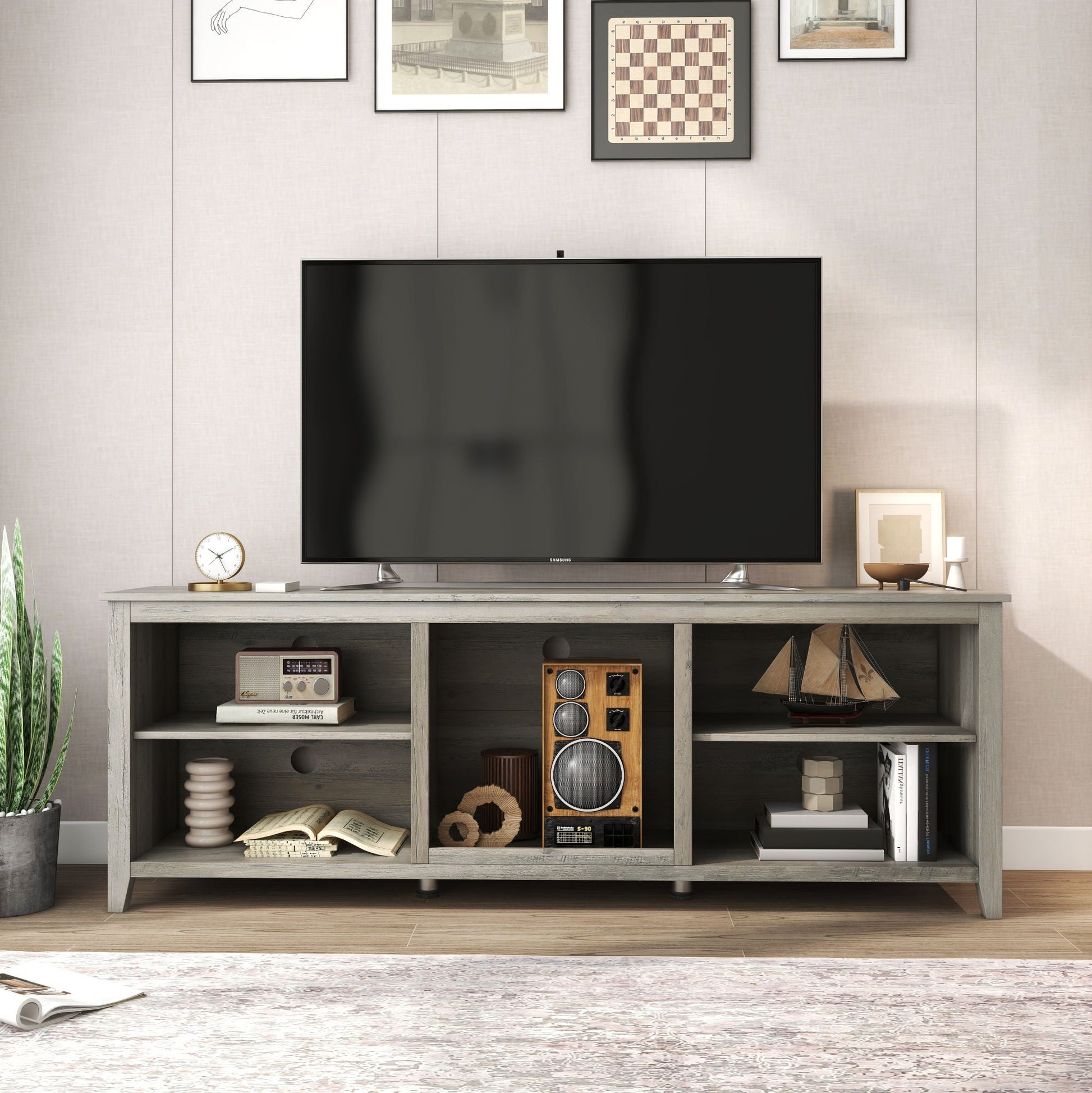 TV stand media console with central speaker cubby and open side shelves, light gray