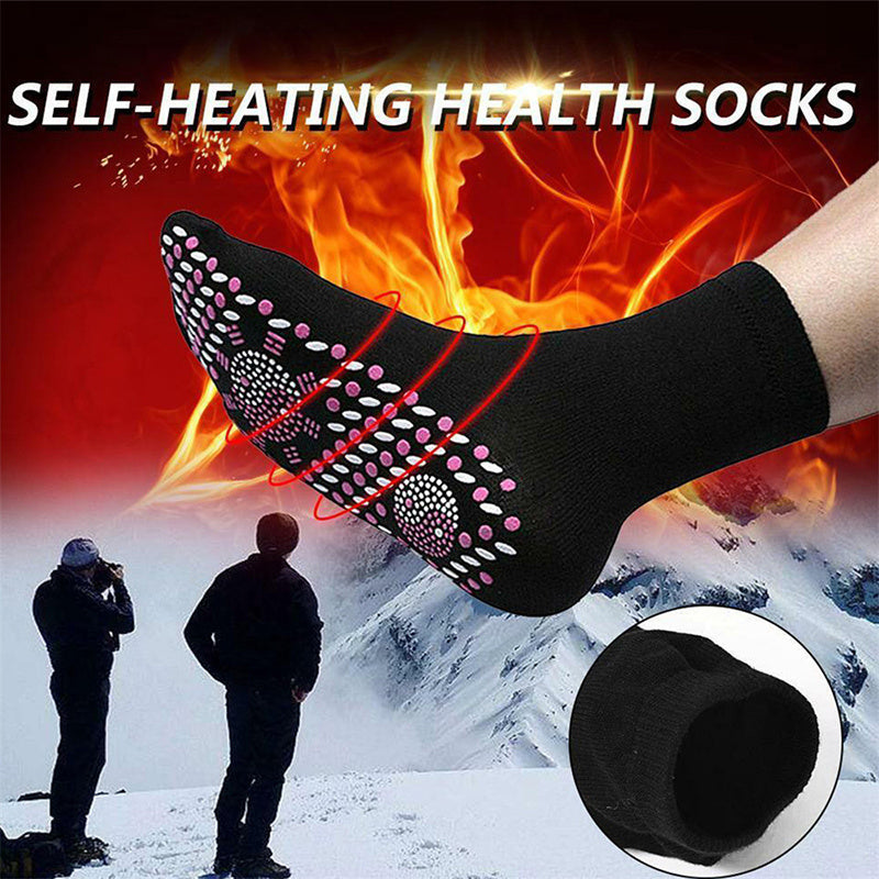 Winter self-heating health care socks, black with pink dot grip pattern and heel view