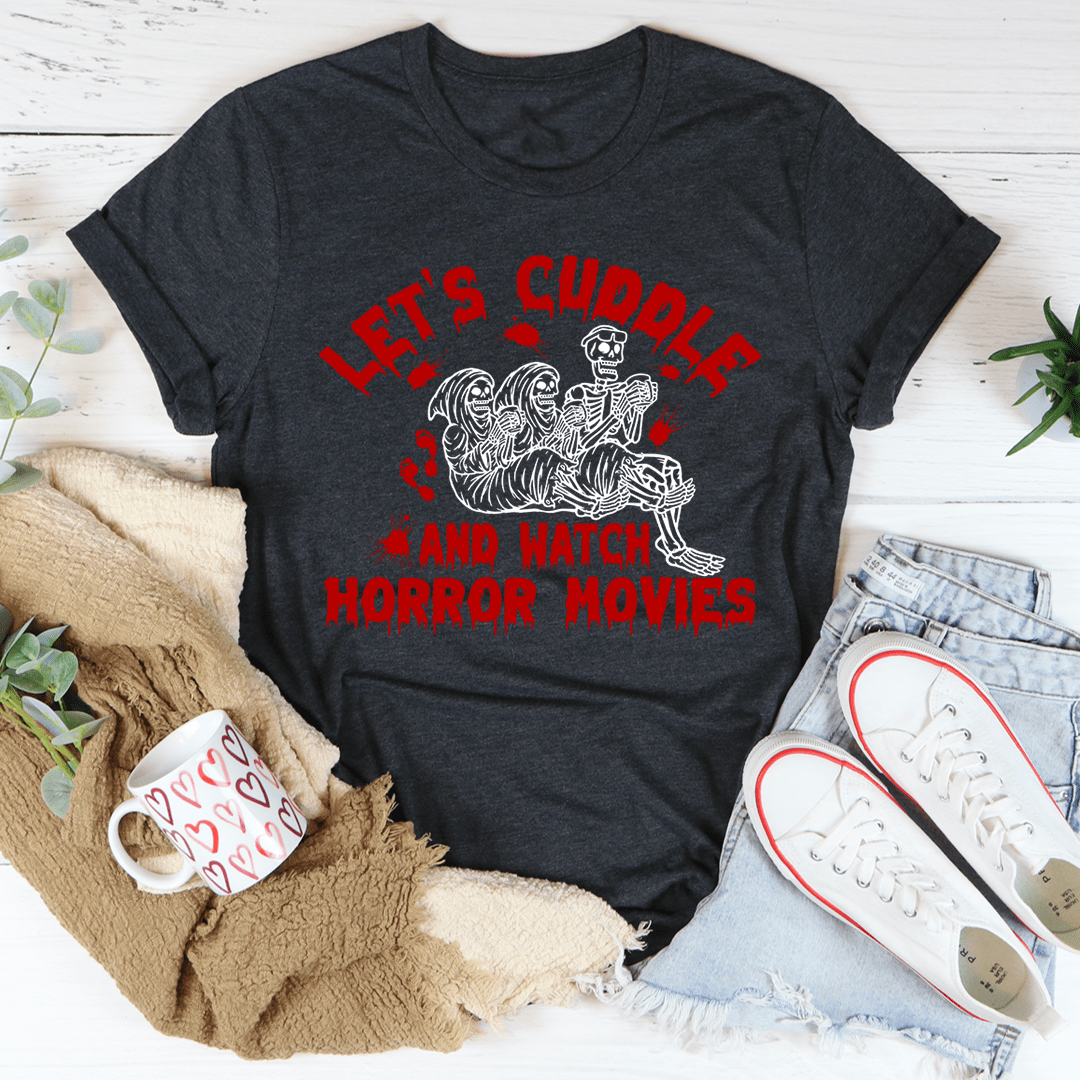 Dark charcoal crew-neck T-shirt with red graphic print: skeletons holding hands, horror movie message