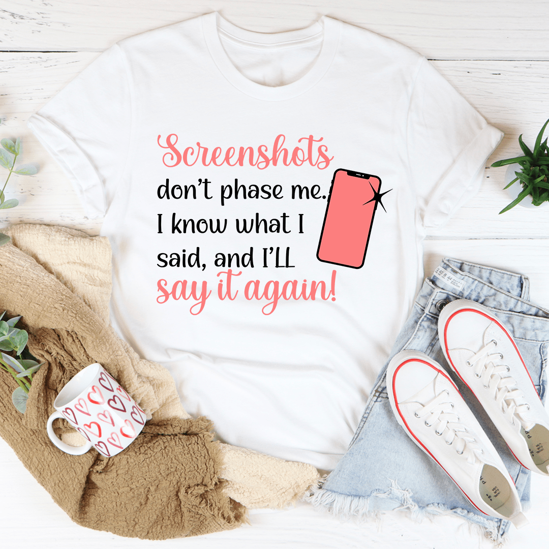 White graphic T-shirt with coral and black quote text and a drink can illustration