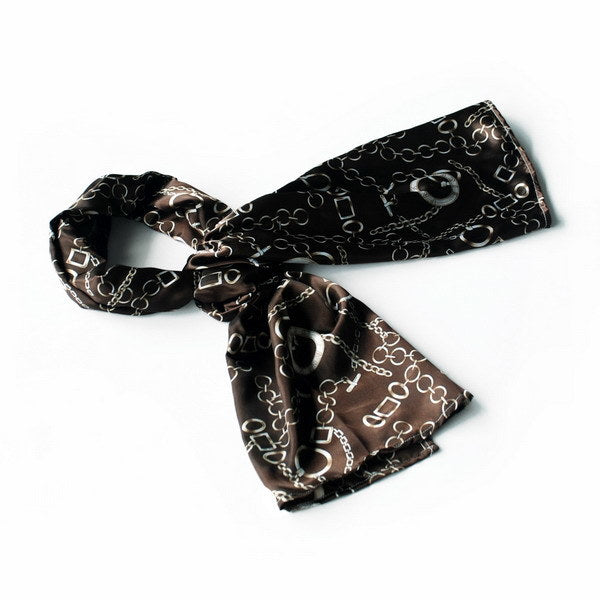 Large silk scarf, dark with gold chain-circle print, folded flat.