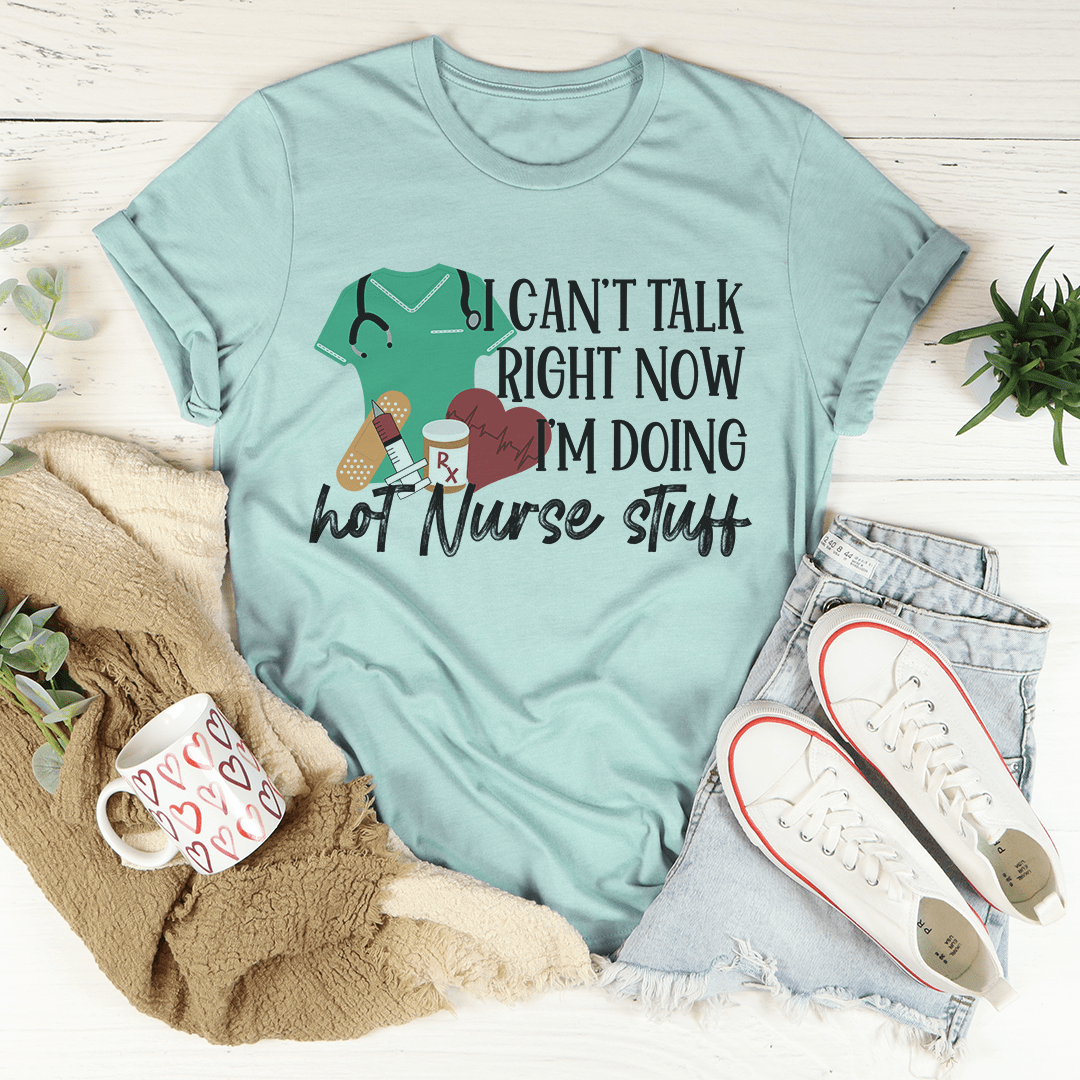 Teal nurse T-shirt with colorful text and scrub graphic