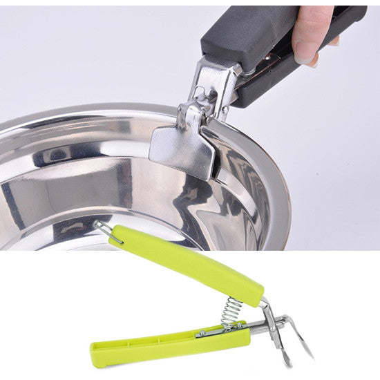 Hot pot picker with green handle and silver claw gripping a pot rim