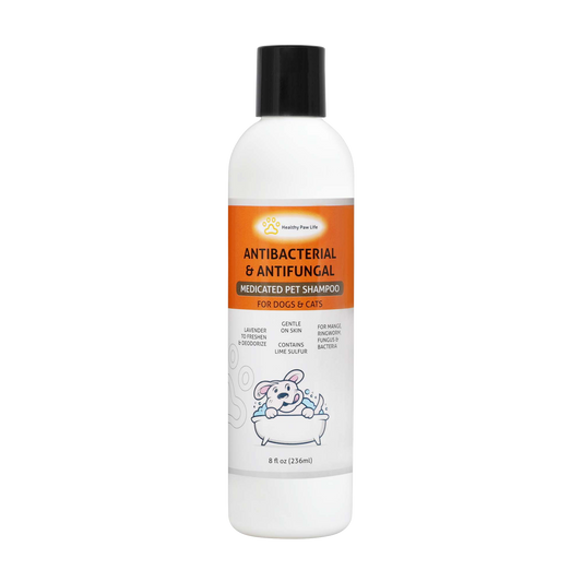 Medicated pet shampoo bottle with black cap, white label, antibacterial & antifungal