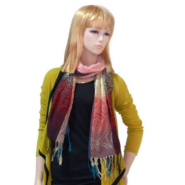 Pashmina shawl draped on model, multicolor moon and star pattern with tassels