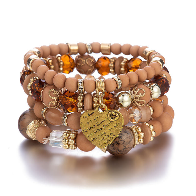Heart charm bead layered bracelet set with tan and amber beads and gold-tone heart pendant