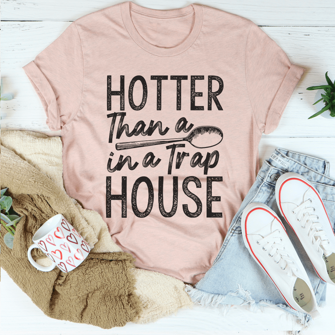 Rose-pink T-shirt with bold 'HOTTER than a Trap HOUSE' graphic print